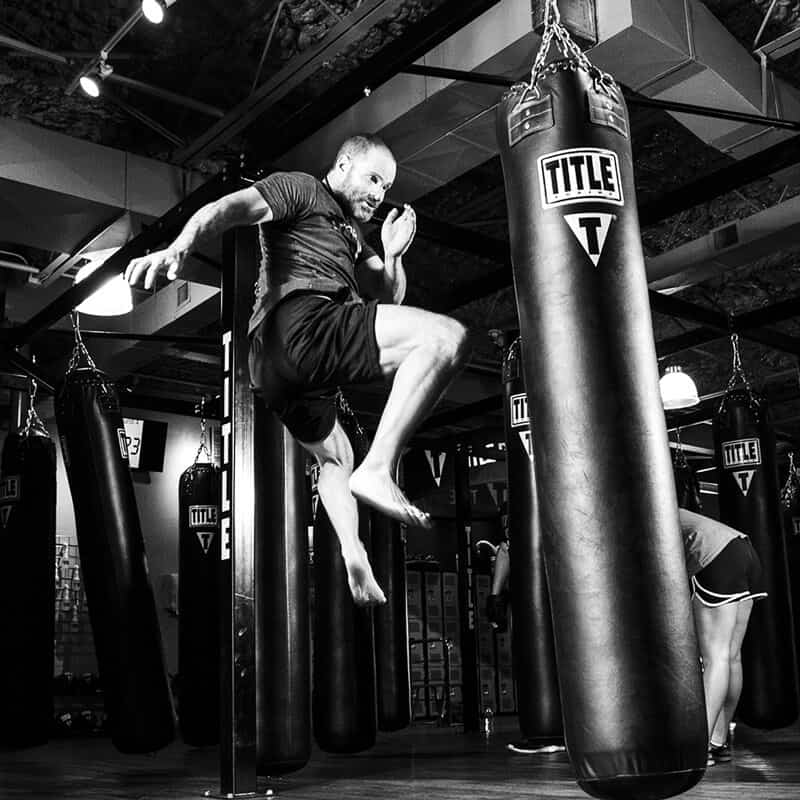 Mixed Martial Arts Lessons for Adults in Austin TX - Flying Knee Black and White MMA